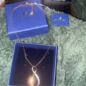 Swarovski infinity necklace gold rose-tone